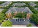 Aerial view of apartment building complex with lush landscaping, well-maintained grounds, and parking lot at 4207 S Dale Mabry Hwy # 8304, Tampa, FL 33611