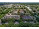Aerial view showcases a community surrounded by lush greenery and neighborhood amenities at 4207 S Dale Mabry Hwy # 8304, Tampa, FL 33611