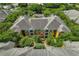 A symmetrical building surrounded by green trees at 4207 S Dale Mabry Hwy # 8304, Tampa, FL 33611