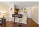Dining area that features hardwood floors, a breakfast bar, and stainless steel appliances at 4207 S Dale Mabry Hwy # 8304, Tampa, FL 33611