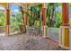 Charming outdoor gazebo featuring seating and a brick-paved surface surrounded by lush greenery at 4207 S Dale Mabry Hwy # 8304, Tampa, FL 33611