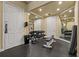 Well equipped fitness center with weight rack, bench, mirrors, and rubber floor at 4207 S Dale Mabry Hwy # 8304, Tampa, FL 33611