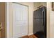 Galley kitchen featuring a refrigerator, and a closet with bi-fold doors at 4207 S Dale Mabry Hwy # 8304, Tampa, FL 33611