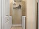 Functional laundry area with shelving for storage, washer, and dryer for added convenience at 4207 S Dale Mabry Hwy # 8304, Tampa, FL 33611