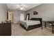 Inviting main bedroom featuring a ceiling fan, mirror and neutral decor for a relaxing and comfortable atmosphere at 4207 S Dale Mabry Hwy # 8304, Tampa, FL 33611