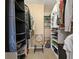 Organized walk-in closet featuring ample shelving, hanging space, and storage solutions for all your wardrobe needs at 4207 S Dale Mabry Hwy # 8304, Tampa, FL 33611