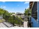 Backyard view of a waterfront property with a deck overlooking the canal and neighboring homes, showcasing serene outdoor living at 428 Klosterman W Rd, Palm Harbor, FL 34683