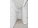 A large closet with white shelving and a sliding door at 428 Klosterman W Rd, Palm Harbor, FL 34683