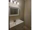 Bathroom highlighting a vanity with storage, a mirror, and a light fixture at 474 Hinton St, Port Charlotte, FL 33954