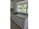 Kitchen sink and window overlooking the backyard at 474 Hinton St, Port Charlotte, FL 33954