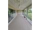 Large screened-in patio with ceiling fans at 474 Hinton St, Port Charlotte, FL 33954