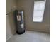 Utility room with water heater at 474 Hinton St, Port Charlotte, FL 33954