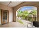 Private balcony with seating and views of lush landscaping at 504 S Armenia Ave # 1329B, Tampa, FL 33609