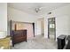 Cozy bedroom featuring neutral carpet, ceiling fan, and closet for storage at 504 S Armenia Ave # 1329B, Tampa, FL 33609
