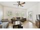 Comfortable living room with large windows and stylish furnishings at 504 S Armenia Ave # 1329B, Tampa, FL 33609