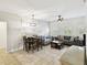 Bright living room with tile flooring, ceiling fan, and stylish decor at 504 S Armenia Ave # 1329B, Tampa, FL 33609
