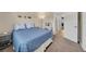 Cozy bedroom with neutral walls, comfy bed, and a quaint vanity area, creating a relaxing retreat at 5044 17Th N St, St Petersburg, FL 33714