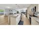 Bright, modern kitchen with granite counters, stainless steel appliances, and open floor plan at 5044 17Th N St, St Petersburg, FL 33714