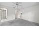Spacious bedroom showing entrances to bathroom and other rooms at 506 Duxbury Ct # A, Safety Harbor, FL 34695