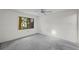 Bedroom featuring a large window providing ample natural light at 506 Duxbury Ct # A, Safety Harbor, FL 34695