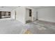 Spacious living room featuring bare floors and plenty of natural light at 506 Duxbury Ct # A, Safety Harbor, FL 34695