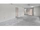 Another angle of the living room showcasing the space and bare floors at 506 Duxbury Ct # A, Safety Harbor, FL 34695