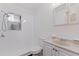 Bright bathroom features a shower, vanity, and medicine cabinet above the toilet at 5221 4Th N Ave, St Petersburg, FL 33710