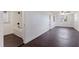 Bright room next to an updated bathroom offers hardwood floors and access to an enclosed lanai with a large window at 5221 4Th N Ave, St Petersburg, FL 33710