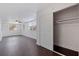 Spacious bedroom with hardwood floors, closet and bright natural light from multiple windows creating an airy atmosphere at 5221 4Th N Ave, St Petersburg, FL 33710