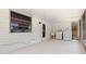 View of the screened-in porch with laundry machines at 5221 4Th N Ave, St Petersburg, FL 33710