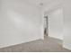 Bright bedroom with grey laminate floors and an entry to another room and bathroom at 6019 Shorebird Br, Land O Lakes, FL 34638