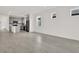 Bright and airy living room featuring tile floors and a modern, open layout at 6019 Shorebird Br, Land O Lakes, FL 34638