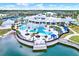 A stunning resort-style pool area features multiple pools, cabanas, and lounge chairs at 6019 Shorebird Br, Land O Lakes, FL 34638