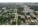 Aerial view of the neighborhood, showcasing residential streets and surrounding landscape at 606 N Merrin St, Plant City, FL 33563