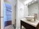 Bathroom featuring vessel sink, modern fixtures, and tile accents at 606 N Merrin St, Plant City, FL 33563