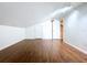 This bedroom features hardwood floors and neutral paint, creating a blank canvas ready for your design ideas at 606 N Merrin St, Plant City, FL 33563