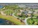 Aerial view of community park with walking paths, playground, and picnic areas at 6331 Voyagers Pl, Apollo Beach, FL 33572