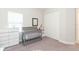 Bedroom featuring grey crib, neutral colors, and closet at 6331 Voyagers Pl, Apollo Beach, FL 33572