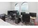 Spacious office with multiple workstations and ample natural light from large windows at 6331 Voyagers Pl, Apollo Beach, FL 33572
