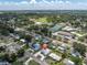 Aerial view of property highlighting neighborhood amenities like tennis courts and baseball field at 6511 10Th N St, St Petersburg, FL 33702