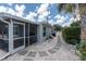 Spacious backyard with a screened-in porch and well-maintained yard, perfect for outdoor living at 6511 10Th N St, St Petersburg, FL 33702
