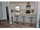 Bright kitchen with an island, stainless steel appliances, and sleek cabinetry for an inviting space at 7684 Oakhurst Rd, Seminole, FL 33776