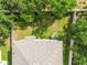 Aerial view of a well-maintained backyard with lush green grass and landscaping at 9329 Wellstone Dr, Land O Lakes, FL 34638