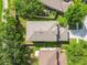 Aerial view of the home and surrounding area showcasing the property's location and landscaping at 9329 Wellstone Dr, Land O Lakes, FL 34638