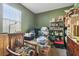Cluttered storage room with exposed storage and various household items at 9329 Wellstone Dr, Land O Lakes, FL 34638