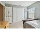 Bedroom features a closet, carpet flooring, and a window with blinds at 9329 Wellstone Dr, Land O Lakes, FL 34638