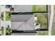 Aerial view of a well-maintained home with a spacious backyard and fenced perimeter at 9839 Lemon Drop Loop, Sun City Center, FL 33573