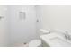 Updated bathroom featuring subway tiles in the shower, mosaic tile floor and updated vanity at 1008 Shangri La Dr, Seffner, FL 33584