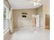 The bedroom features tile flooring, a window, and a closet at 10304 Rainbow Oaks Dr, Hudson, FL 34667