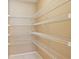 This walk-in closet features a well-organized wire shelving system at 10304 Rainbow Oaks Dr, Hudson, FL 34667